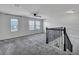 Spacious loft area with ample natural light and a view of the neighborhood at 429 Cherrybark Oak St, Summerville, SC 29486