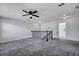 Spacious loft area with ample natural light and a ceiling fan at 429 Cherrybark Oak St, Summerville, SC 29486