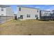 A fenced backyard with a grill, trampoline and a patio; perfect for Gathering fun at 433 Cedarview Rd, Summerville, SC 29486