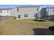 A fenced backyard with a grill, trampoline and a patio; perfect for Gathering fun at 433 Cedarview Rd, Summerville, SC 29486