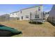 Spacious backyard with a privacy fence, trampoline and a green slide at 433 Cedarview Rd, Summerville, SC 29486
