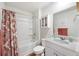 Bright bathroom featuring a shower-tub combination, white vanity with sink, and decorative accents at 433 Cedarview Rd, Summerville, SC 29486
