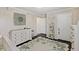Stylish Bedroom with changing table, crib, and decorative wall accents, creating a peaceful environment at 433 Cedarview Rd, Summerville, SC 29486