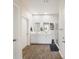 Bright main bathroom with double sinks, white cabinetry, recessed lighting, and a glass-enclosed shower at 433 Cedarview Rd, Summerville, SC 29486