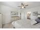 Spacious main bedroom featuring a comfortable bed, dresser, mirror, ceiling fan, and natural light at 433 Cedarview Rd, Summerville, SC 29486