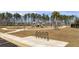 Playground in a community featuring benches, bicycle racks, and pathways at 433 Cedarview Rd, Summerville, SC 29486