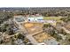 Aerial view showing athletic fields, tennis courts, and a large multi-use building with baseball field at 4816 Chesterfield Rd, North Charleston, SC 29405
