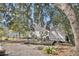 Lush backyard features a deck, mature trees, and great outdoor space at 4816 Chesterfield Rd, North Charleston, SC 29405