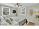 Inviting bedroom with soothing light gray walls, hardwood floors and modern decor at 4816 Chesterfield Rd, North Charleston, SC 29405