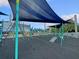 Playground with various play structures, climbing equipment, and shade sails in a vibrant recreational space at 4816 Chesterfield Rd, North Charleston, SC 29405