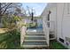 Inviting back deck with outdoor seating, ideal for relaxation or entertaining guests at 5332 Parkside Dr, North Charleston, SC 29405