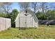 Exterior view of barn with green grass and trees at 5332 Parkside Dr, North Charleston, SC 29405