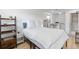 Bright bedroom featuring hardwood floors, kitchenette and closet at 5332 Parkside Dr, North Charleston, SC 29405