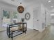 Inviting dining area with modern light fixture and access to outdoor living space, perfect for entertaining guests at 5332 Parkside Dr, North Charleston, SC 29405