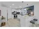 Modern kitchen with stainless steel appliances, white cabinetry, and sleek countertops at 5332 Parkside Dr, North Charleston, SC 29405
