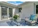 Charming patio with comfortable seating, a patterned rug, and access to the interior, creating a cozy outdoor retreat at 5332 Parkside Dr, North Charleston, SC 29405