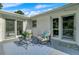 Relaxing patio with stylish outdoor seating, a decorative rug, and seamless access to indoor and outdoor living spaces at 5332 Parkside Dr, North Charleston, SC 29405
