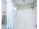 Bright bathroom featuring a shower with white tile, window, and modern fixtures at 613 Salterton St, Summerville, SC 29485