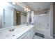 Bathroom featuring double sinks, ample counter space, and bathtub with a shower at 613 Salterton St, Summerville, SC 29485