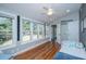Cozy bedroom features wood floors, generous natural light, and closet space for storage at 613 Salterton St, Summerville, SC 29485