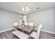 Elegant dining room with modern table set, perfect for entertaining guests at 613 Salterton St, Summerville, SC 29485