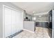 A kitchen with a pantry featuring modern appliances, providing storage and style at 613 Salterton St, Summerville, SC 29485