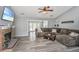 Inviting living room features a cozy brick fireplace and vaulted ceilings at 613 Salterton St, Summerville, SC 29485