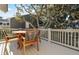 Inviting back deck with outdoor seating, perfect for relaxing and enjoying the surrounding views at 707 Palmetto Blvd, Edisto Island, SC 29438