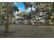 Sprawling backyard, perfect for outdoor activities and relaxation at 707 Palmetto Blvd, Edisto Island, SC 29438