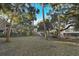 Lush backyard with mature trees, perfect for recreation at 707 Palmetto Blvd, Edisto Island, SC 29438