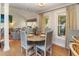 Dining area with view to living space, sofa, and window view at 707 Palmetto Blvd, Edisto Island, SC 29438