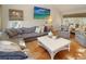 Inviting living room with plush seating, modern decor, and abundant natural light at 707 Palmetto Blvd, Edisto Island, SC 29438