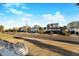 Coastal homes line a street, showcasing the community's beachside charm at 707 Palmetto Blvd, Edisto Island, SC 29438