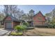 Charming home featuring a covered drive, landscaped yard, and unique architectural details at 720 Island Park Dr # 104, Charleston, SC 29492