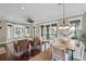 Open-concept living space features natural light, a dining area, and comfortable seating at 720 Island Park Dr # 104, Charleston, SC 29492