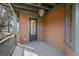 Covered porch features stylish lighting and offers outdoor space for relaxation and enjoyment at 720 Island Park Dr # 104, Charleston, SC 29492