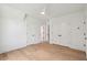 A bright bedroom features hardwood floors, a ceiling fan, and double door closet at 806 Jungle Rd, Edisto Island, SC 29438