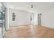 Bright bedroom featuring hardwood floors, neutral walls, and a ceiling fan at 806 Jungle Rd, Edisto Island, SC 29438