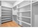 Walk-in closet with custom shelving and storage at 806 Jungle Rd, Edisto Island, SC 29438