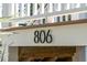 Close-up of the house number '806' displayed on the exterior of the coastal style home at 806 Jungle Rd, Edisto Island, SC 29438