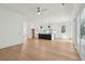Open-concept living space with hardwood floors, a modern kitchen and lots of natural light at 806 Jungle Rd, Edisto Island, SC 29438