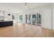 Bright and airy living area with views of the deck through sliding glass doors at 806 Jungle Rd, Edisto Island, SC 29438