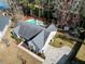 An aerial view of the house showing landscaping, fenced yard and sparkling pool at 8209 Governors Walk, North Charleston, SC 29418