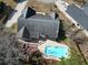 Aerial view of the home showing the pool, deck and fenced-in yard at 8209 Governors Walk, North Charleston, SC 29418