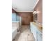 The bathroom has dual sinks, tiled floors, and a shower, providing a spa-like experience at 8209 Governors Walk, North Charleston, SC 29418