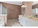 The bathroom has dual sinks, tiled floors, and a shower, providing a spa-like experience at 8209 Governors Walk, North Charleston, SC 29418