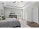 Spacious bedroom with tray ceilings, hardwood floors, and a serene atmosphere at 8209 Governors Walk, North Charleston, SC 29418