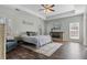 Calm bedroom featuring tray ceiling, natural light, and cozy decor for a peaceful retreat at 8209 Governors Walk, North Charleston, SC 29418