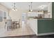 Bright dining area with tile floors, chandelier, and natural light that opens to the kitchen at 8209 Governors Walk, North Charleston, SC 29418