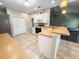 Well-equipped kitchen featuring tiled floors and a breakfast bar that opens into the living area at 8209 Governors Walk, North Charleston, SC 29418